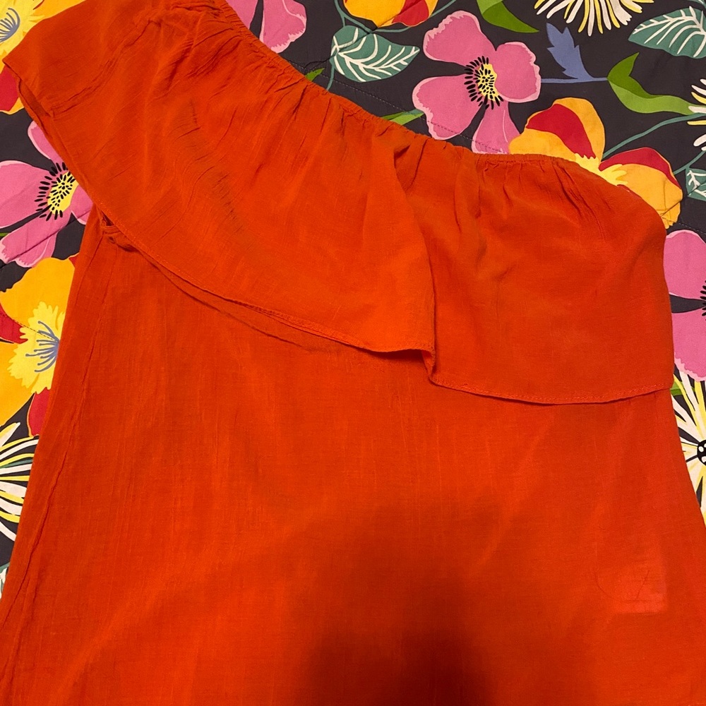 Orange blouse, one shoulder